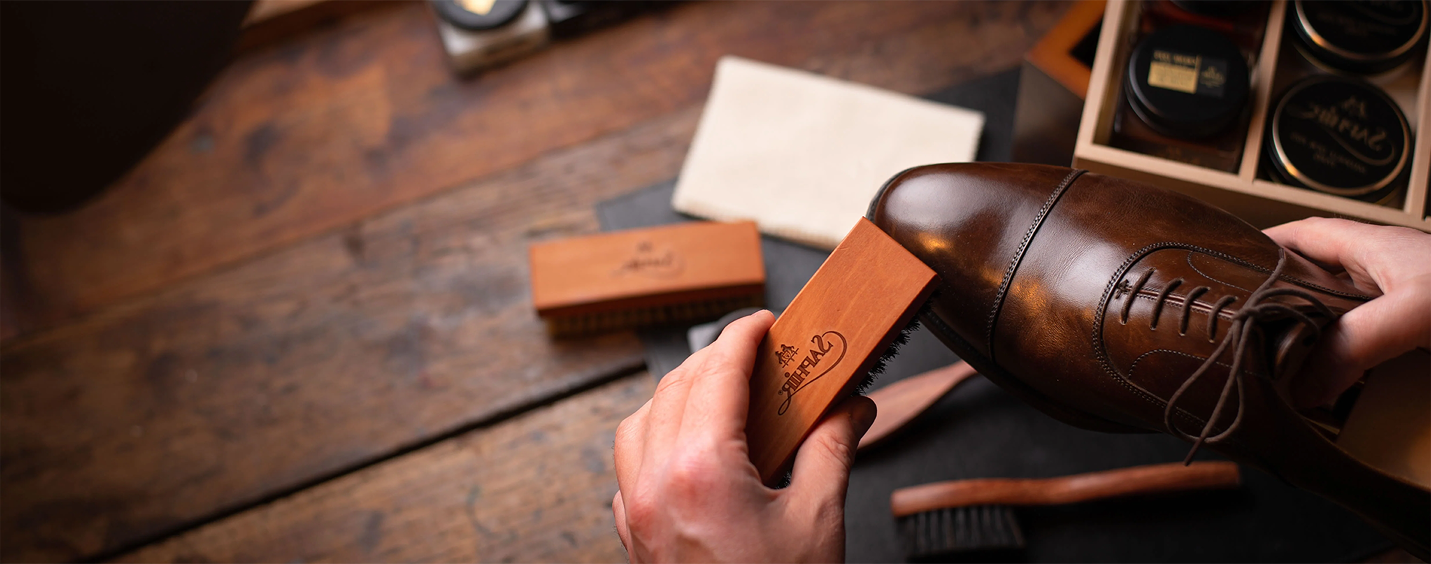 Premium shoe cleaning service - leather shoe with cleaning brush